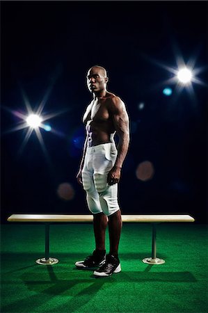 simsearch:614-08875662,k - Portrait of bare chested american footballer Photographie de stock - Premium Libres de Droits, Code: 614-08875735