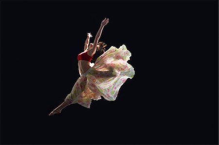simsearch:614-08875951,k - Dancer in midair wearing tutu Photographie de stock - Premium Libres de Droits, Code: 614-08875945