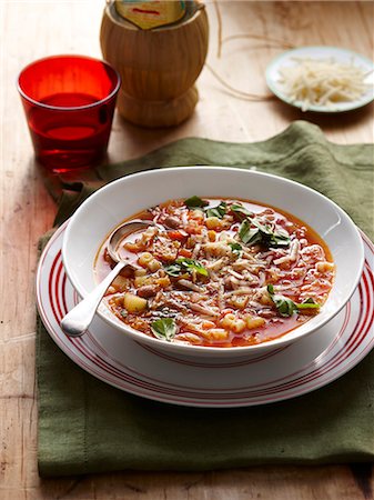 Still life with bowl of minestrone soup Stock Photo - Premium Royalty-Free, Code: 614-08876339