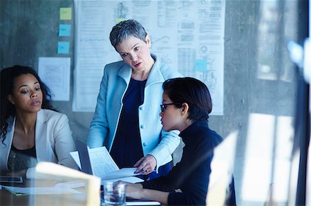 simsearch:614-06718224,k - Three businesswomen meeting in boardroom Stock Photo - Premium Royalty-Free, Code: 614-08876612