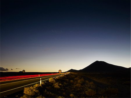 simsearch:614-08876683,k - Highway taillight trails at dawn, Lanzarote, Spain Stockbilder - Premium RF Lizenzfrei, Bildnummer: 614-08876830