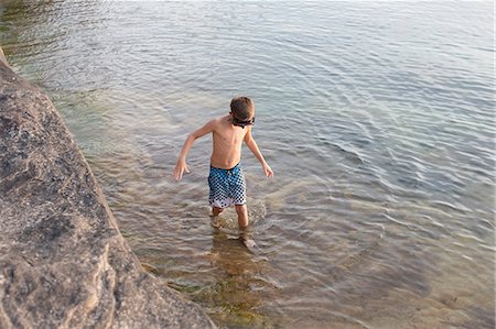 simsearch:614-03455029,k - High angle view of teenage boy paddling in Lake Superior, Au Train, Michigan, USA Stock Photo - Premium Royalty-Free, Code: 614-08876831