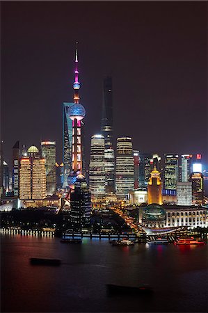 Oriental Pearl Tower at night,  Shanghai Tower (under construction) and Shanghai World Financial Centre in Pudong, Shanghai, China Photographie de stock - Premium Libres de Droits, Code: 614-08876981