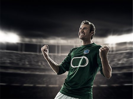 Footballer celebrating goal Stock Photo - Premium Royalty-Free, Code: 614-08876982