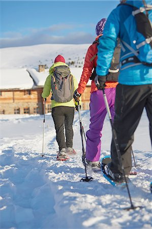 simsearch:854-03537981,k - Rear view of three mid adult friends snowshoeing in Dolomites, Eisack Valley, South Tyrol, Italy Stock Photo - Premium Royalty-Free, Code: 614-08877326