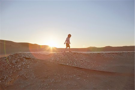 simsearch:614-09210874,k - Boy walking on sand dune, Namib Naukluft National Park, Namib Desert, Sossusvlei, Dead Vlei, Africa Stock Photo - Premium Royalty-Free, Code: 614-08877465