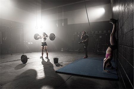 simsearch:614-08877527,k - Group of people working out in gym Stock Photo - Premium Royalty-Free, Code: 614-08877529