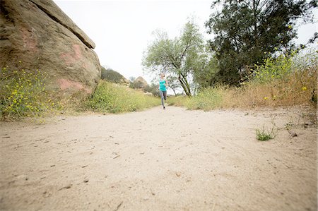 simsearch:614-08878338,k - Jogger running in park, Stoney Point, Topanga Canyon, Chatsworth, Los Angeles, California, USA Photographie de stock - Premium Libres de Droits, Code: 614-08878348