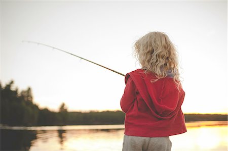 Girl fishing, Kings Lake, Ontario, Canada Stock Photo - Premium Royalty-Free, Code: 614-08878499