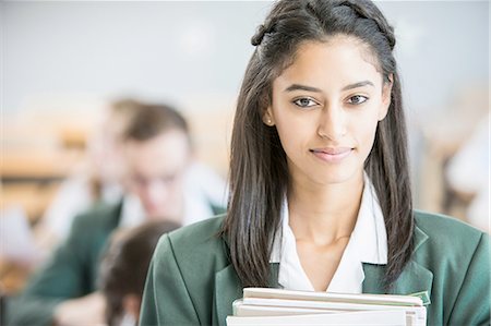 simsearch:614-02984848,k - Student in classroom, classmates in background Stock Photo - Premium Royalty-Free, Code: 614-08878761