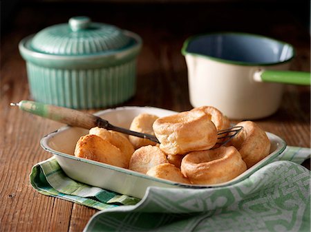 simsearch:614-08879057,k - Dish of roast potatoes and yorkshire puddings with vintage props on wood Stock Photo - Premium Royalty-Free, Code: 614-08878803