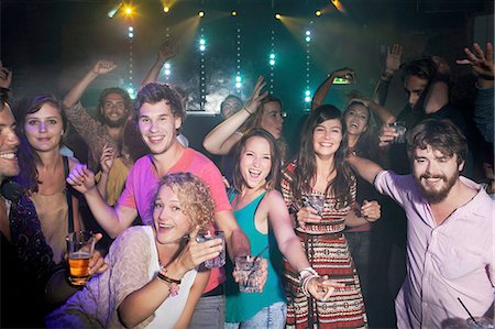 people gathering crowd - Group of friends celebrating in club Stock Photo - Premium Royalty-Free, Code: 614-08878954