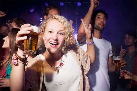 simsearch:649-09209314,k - Group of friends celebrating in club Stock Photo - Premium Royalty-Free, Code: 614-08878952