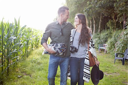 simsearch:614-08879491,k - Romantic couple strolling together in field Stock Photo - Premium Royalty-Free, Code: 614-08879475