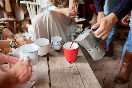 simsearch:614-08879491,k - Cropped shot of adult friends pouring coffee in cabin Stock Photo - Premium Royalty-Free, Code: 614-08879507