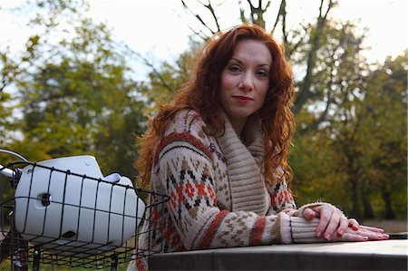 picture autumn london - Woman sitting with bicycle in park Stock Photo - Premium Royalty-Free, Code: 614-08870134