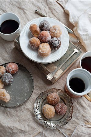 donut hole - Plate of desserts with coffee Stock Photo - Premium Royalty-Free, Code: 614-08870415