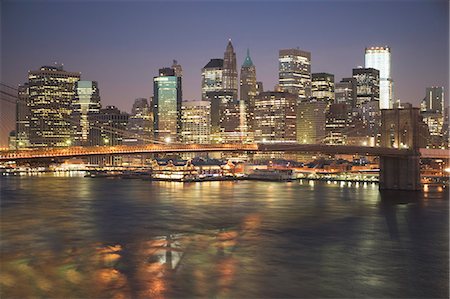 simsearch:614-08876867,k - New York City lit up at night Fotografie stock - Premium Royalty-Free, Codice: 614-08870674