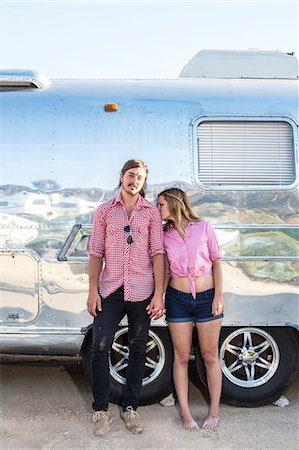 simsearch:614-08329454,k - Couple standing by trailer Stock Photo - Premium Royalty-Free, Code: 614-08870729