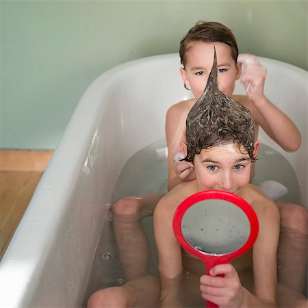 funny hairdo - Boys playing together in bath Stock Photo - Premium Royalty-Free, Code: 614-08870758