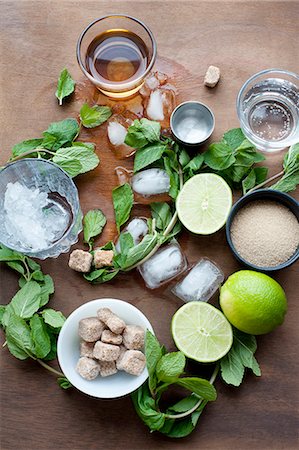 Herbs, lime, sugar and ice cubes Stock Photo - Premium Royalty-Free, Code: 614-08871408