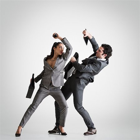 simsearch:614-02934906,k - Business couple fighting Foto de stock - Sin royalties Premium, Código: 614-08871635