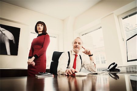 Secretary with senior manager in office Stock Photo - Premium Royalty-Free, Code: 614-08871759
