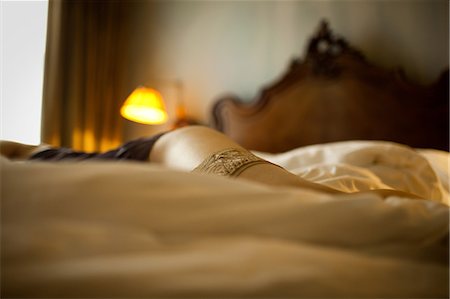 simsearch:614-08874246,k - Woman lying on bed wearing underwear Stockbilder - Premium RF Lizenzfrei, Bildnummer: 614-08871905