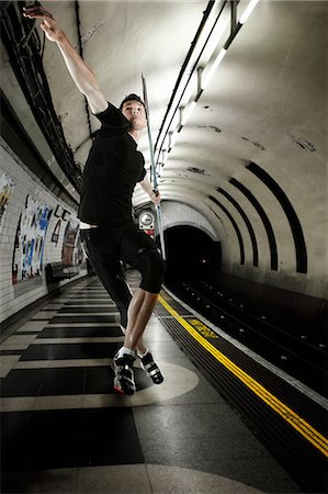 simsearch:614-07146671,k - Javelin thrower in London Underground tunnel Photographie de stock - Premium Libres de Droits, Code: 614-08871945