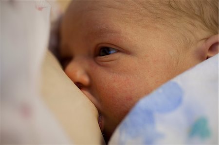simsearch:693-03474462,k - Mother breastfeeding newborn baby boy Stock Photo - Premium Royalty-Free, Code: 614-08871994