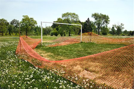 simsearch:6118-09059537,k - Fence on soccer field Stock Photo - Premium Royalty-Free, Code: 614-08872731
