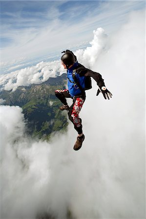 sky-diver (male) - Skydiver over Saanen, Switzerland Stock Photo - Premium Royalty-Free, Code: 614-08872782