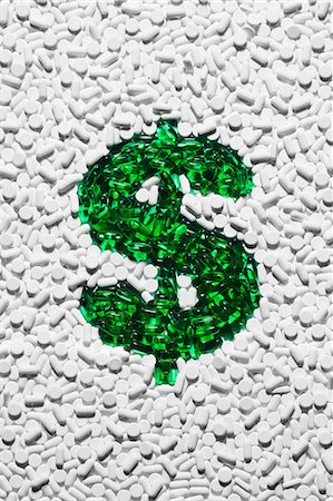 dollar sign of pills - Green dollar sign made up of pills Stock Photo - Premium Royalty-Free, Code: 614-08872954