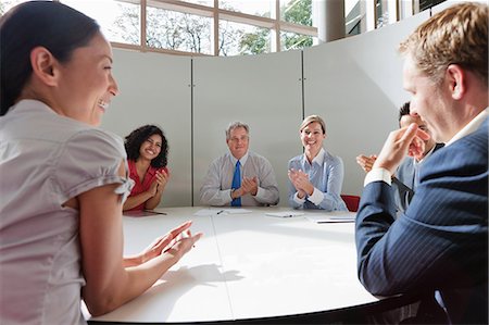 simsearch:614-07487004,k - Business colleagues working together in meeting room Stock Photo - Premium Royalty-Free, Code: 614-08873184