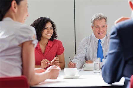 simsearch:614-06896582,k - Business colleagues working together in meeting room Stock Photo - Premium Royalty-Free, Code: 614-08873186