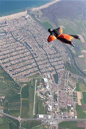 simsearch:649-09207740,k - Man wingsuit flying over Empuriabrava, Spain Stock Photo - Premium Royalty-Free, Code: 614-08873488