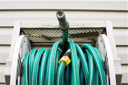 Garden hose Stock Photo - Premium Royalty-Free, Code: 614-08873750