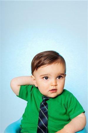 simsearch:614-03576718,k - Baby boy wearing green top and tie Photographie de stock - Premium Libres de Droits, Code: 614-08873892