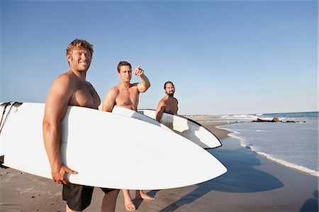surfboard mature man - Three surfers at beach Stock Photo - Premium Royalty-Free, Code: 614-08873925