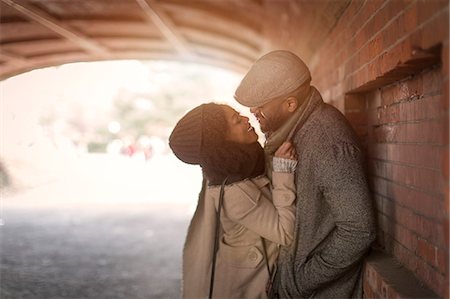 Romantic couple face to face in tunnel Stock Photo - Premium Royalty-Free, Code: 614-08884729