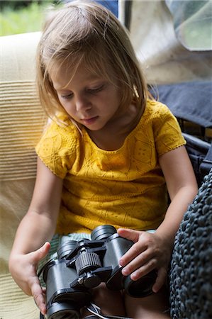 simsearch:614-08487786,k - Young girl holding binoculars Stock Photo - Premium Royalty-Free, Code: 614-08881068