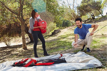 simsearch:614-08488024,k - Mid adult couple camping, erecting their tent Photographie de stock - Premium Libres de Droits, Code: 614-08881320