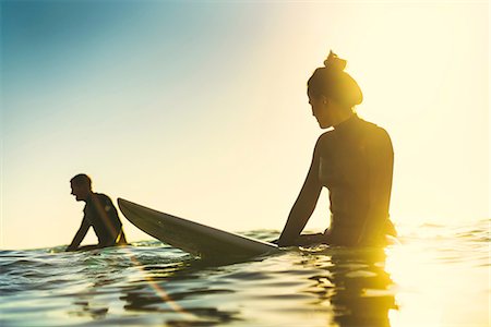 Surfing couple wading in sea, Newport Beach, California, USA Stockbilder - Premium RF Lizenzfrei, Bildnummer: 614-08881432