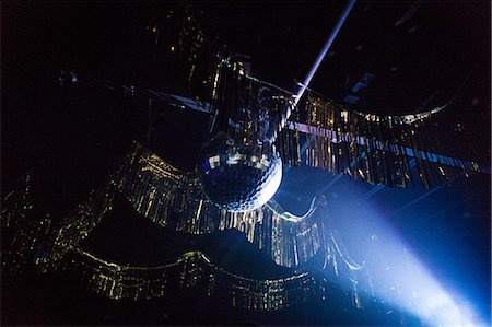 Disco ball hanging from ceiling of nightclub Stock Photo - Premium Royalty-Free, Code: 614-08908637