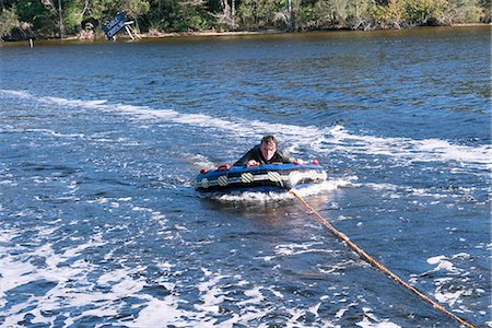 simsearch:614-08926342,k - Teenage boy tubing, Poquito Bayou, Shalimar, Florida, USA Stockbilder - Premium RF Lizenzfrei, Bildnummer: 614-08926327