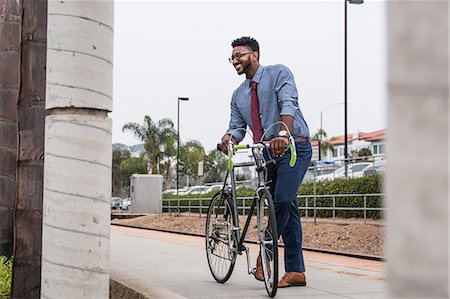 simsearch:614-08926442,k - Young businessman cyclist on rail station platform Stock Photo - Premium Royalty-Free, Code: 614-08926457