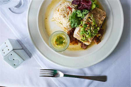 fish meals - Grilled Mahi Mahi, with fresh vegetables and rice, overhead view Stock Photo - Premium Royalty-Free, Code: 614-08926718