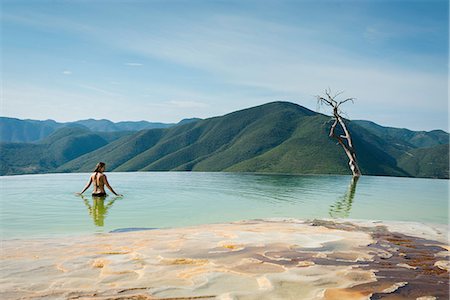 Woman relaxing in thermal spring, Hierve el Agua, Oaxaca, Mexico. Stock Photo - Premium Royalty-Free, Code: 614-08946165
