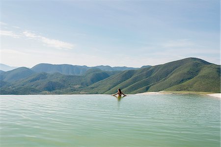 Woman relaxing in thermal spring, Hierve el Agua, Oaxaca, Mexico. Stock Photo - Premium Royalty-Free, Code: 614-08946166