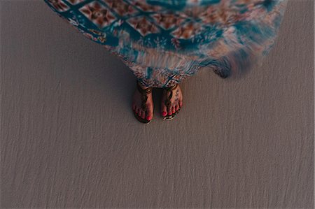 punta cana - High angle view of woman's feet on sand Stock Photo - Premium Royalty-Free, Code: 614-08946339